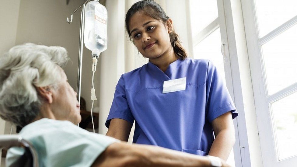 Nurse with patient