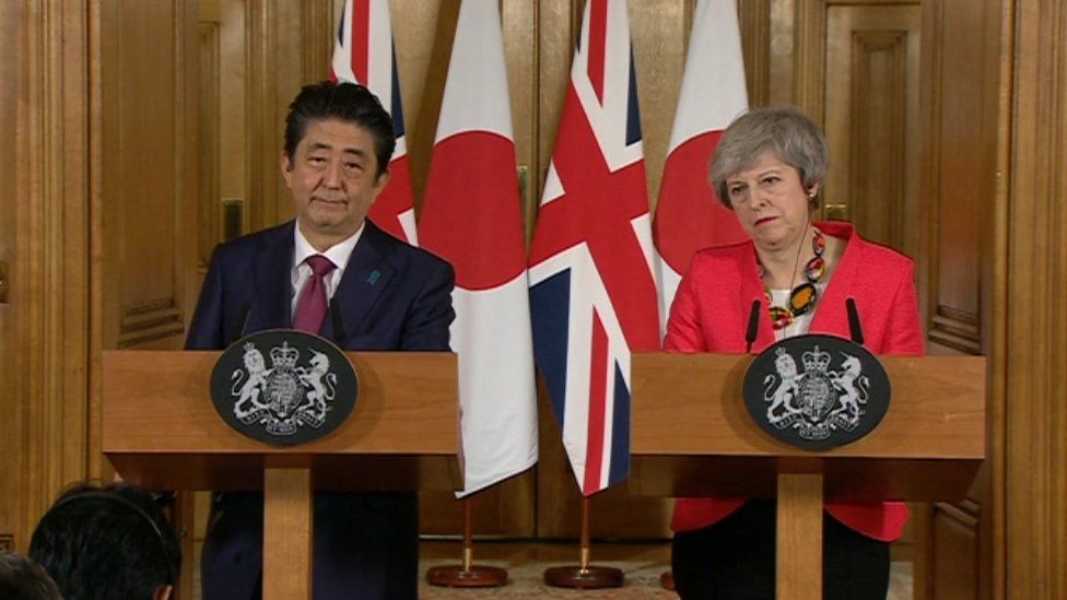 Shinzo Abe a Theresa May