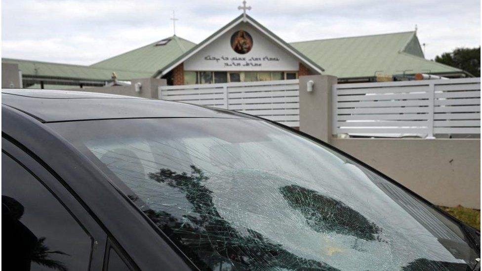 A smashed car windscreen is pictured outside the Assyrian Christ The Good Shepherd Church after a knife attack that took place during a service the night before, in Wakeley in Sydney, Australia, April 16, 2024