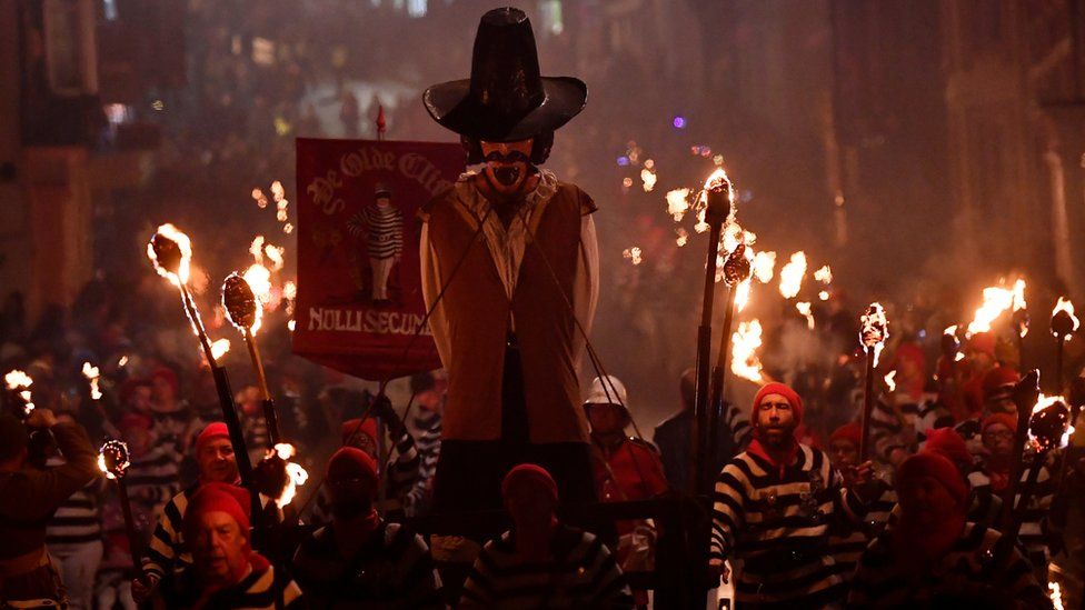 An effigy of Guy Fawkes is paraded through the streets