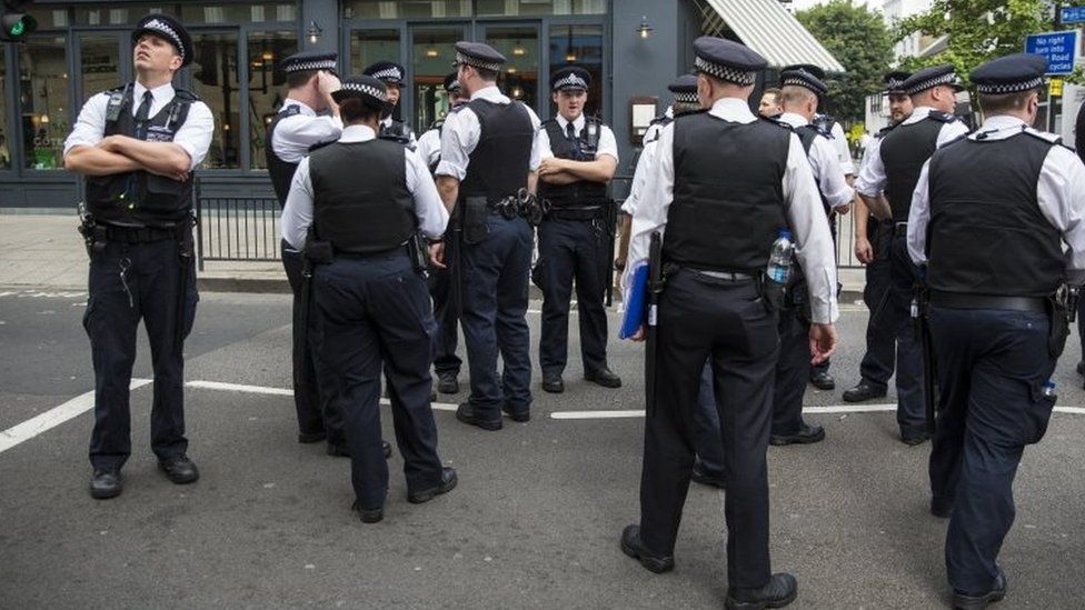 Police assemble at Notting Hill Carnival