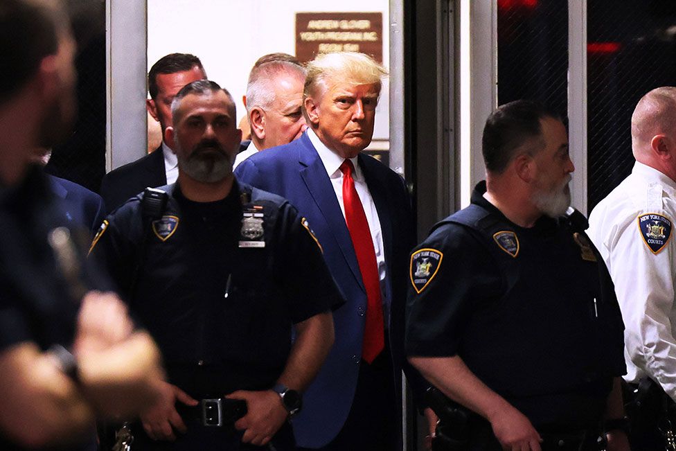 Former US president Donald Trump arrives for his arraignment at Manhattan Criminal Court in New York City on 4 April 2023