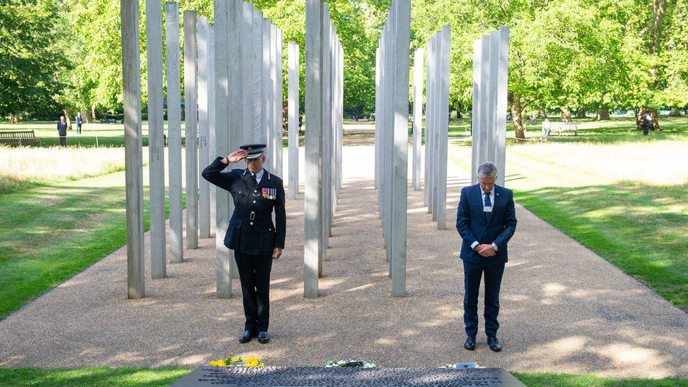 Chief Constable of British Transport Police Paul Crowther (left) and Mike Brown, Commissioner of Transport for London lay wreaths at the London Bombing Memorial i