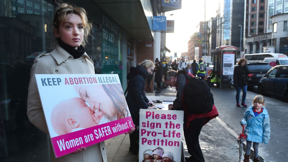 An anti-abortion activist outside the Marie Stopes Clinic on January 12, 2016 in Belfast, Northern Ireland.