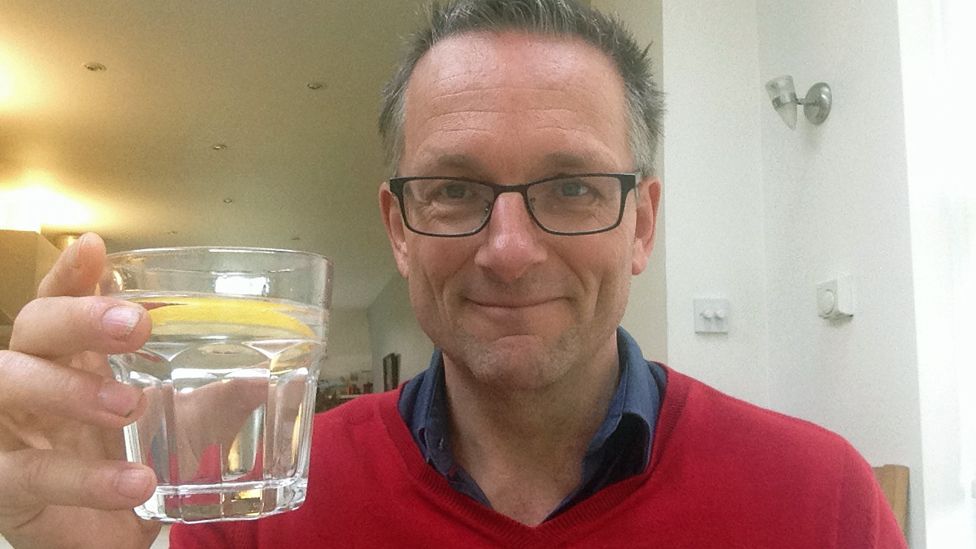 Michael Mosley with glass of water