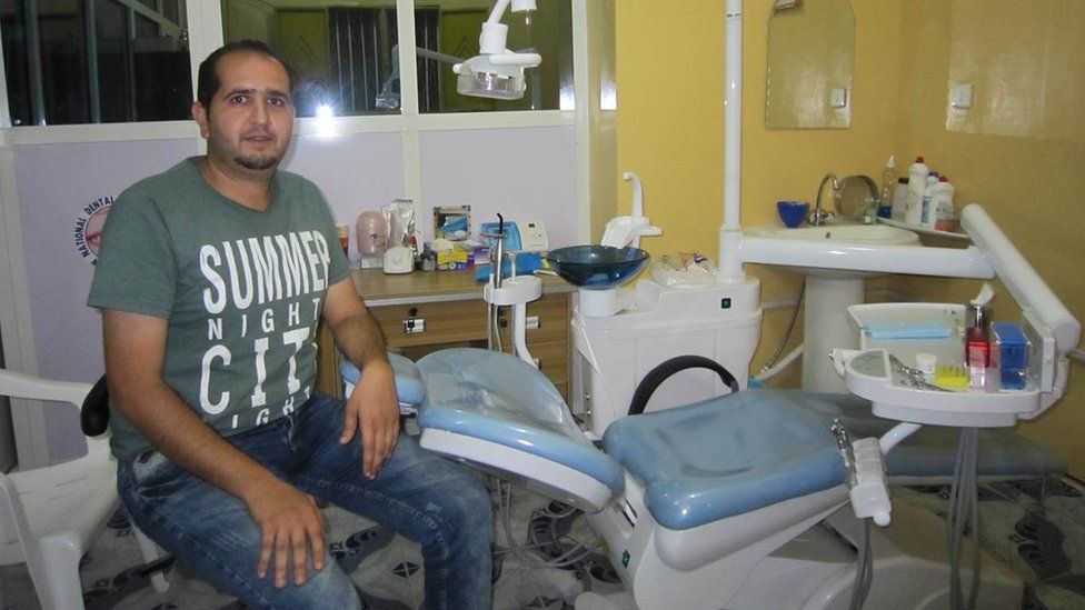 A Syrian dentist sits in his consulting room in Hargeisa, Somaliland