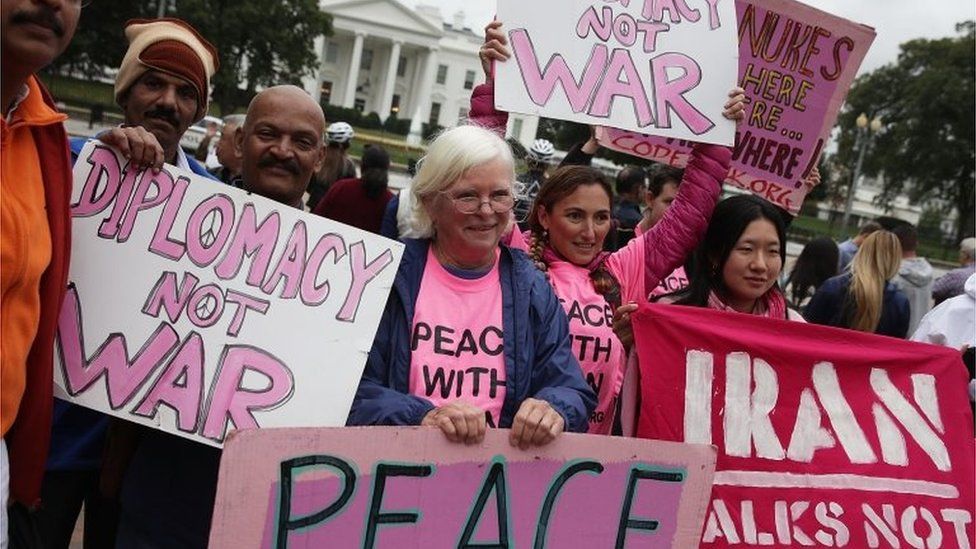 Activists participate in a protest in front of the White House on 12 October.