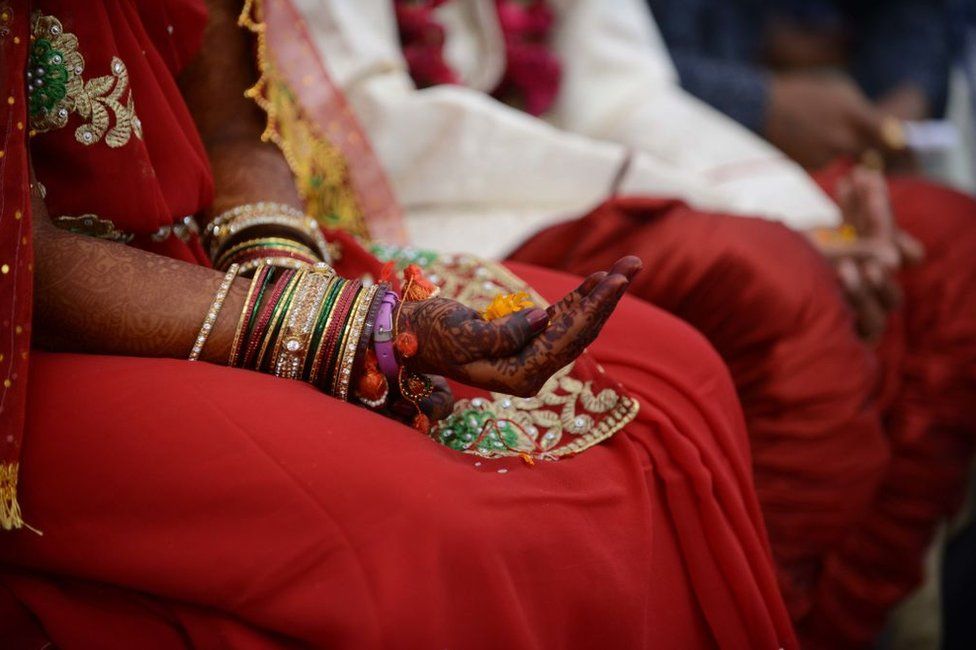 Representational image of a bride and groom