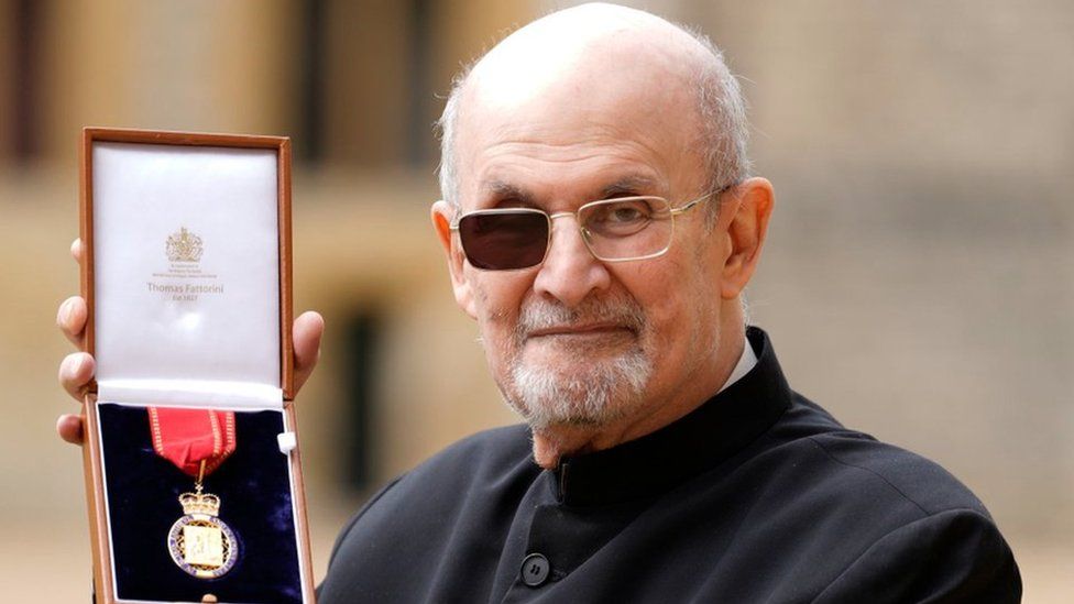 Sir Salman Rushdie with his award