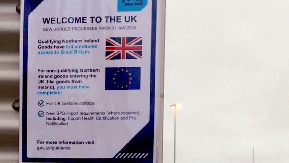 A sign with border process details at Holyhead