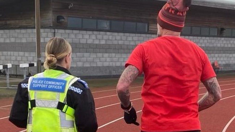 Sgt Templeman running with colleague