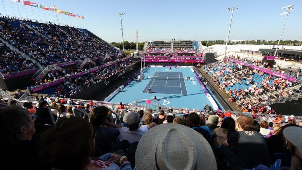 US player Nicholas Taylor and his partner David Wagner take on Britain's Andy Lapthorne and Peter Norfolk in the wheelchair tennis mixed quad doubles final at the London 2012 Paralympic Games at the Olympic Park