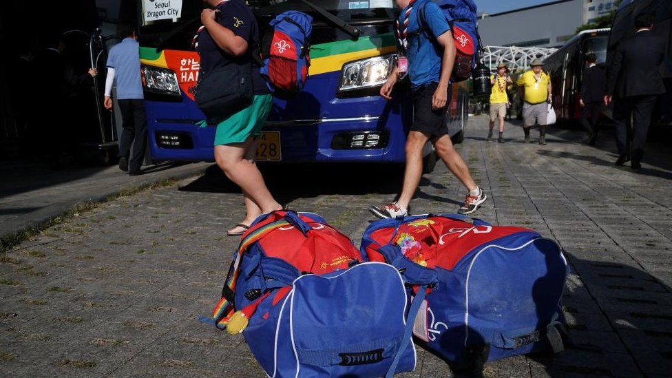 British participants who left a camping site of the 25th World Scout Jamboree arrive at a hotel in Seoul, South Korea, August 5, 2023.