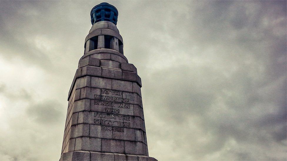 The brazier at the top of the Dundee war memorial is lit to commemorate the Battle of Loos