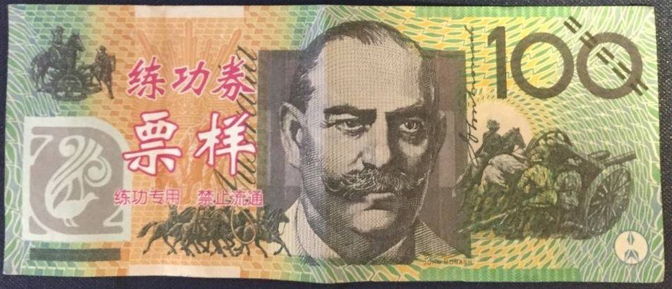 Counterfeit bills marked with Chinese letters being circulated