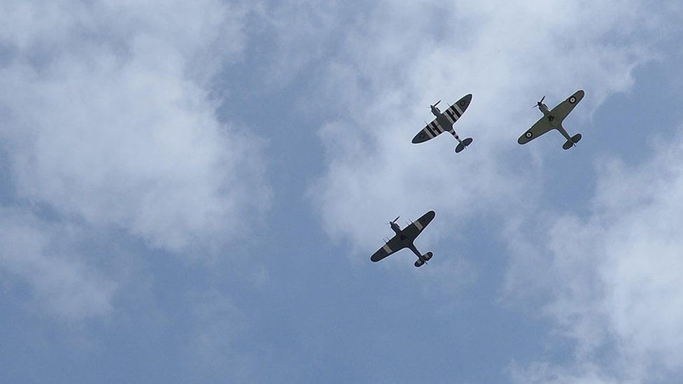 VE Day 70th anniversary celebrations. RAF's wartime fighter planes of the Battle of Britain Memorial Flight flying over Horse Guards, Whitehall, London
