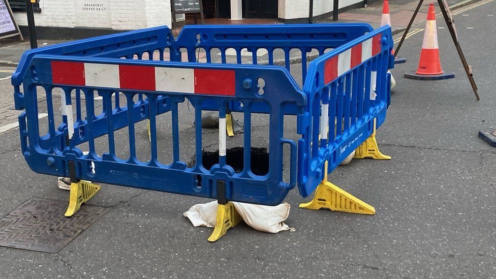 Barriers around a sinkhole in Witham