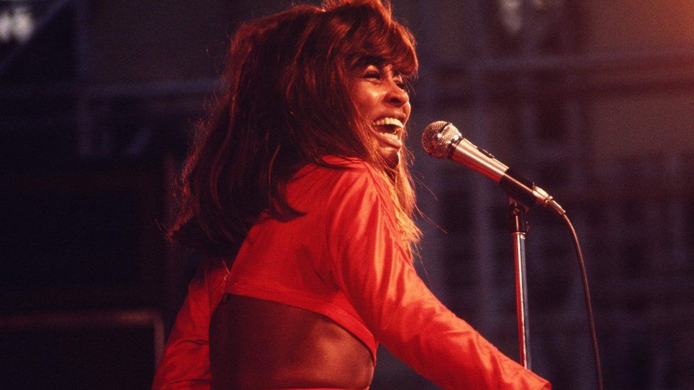 IMAGE SOURCE,GETTY IMAGESImage caption,
Turner was also a style icon - here she's performing in New York's Central Park in 1969 wearing a red leather outfit