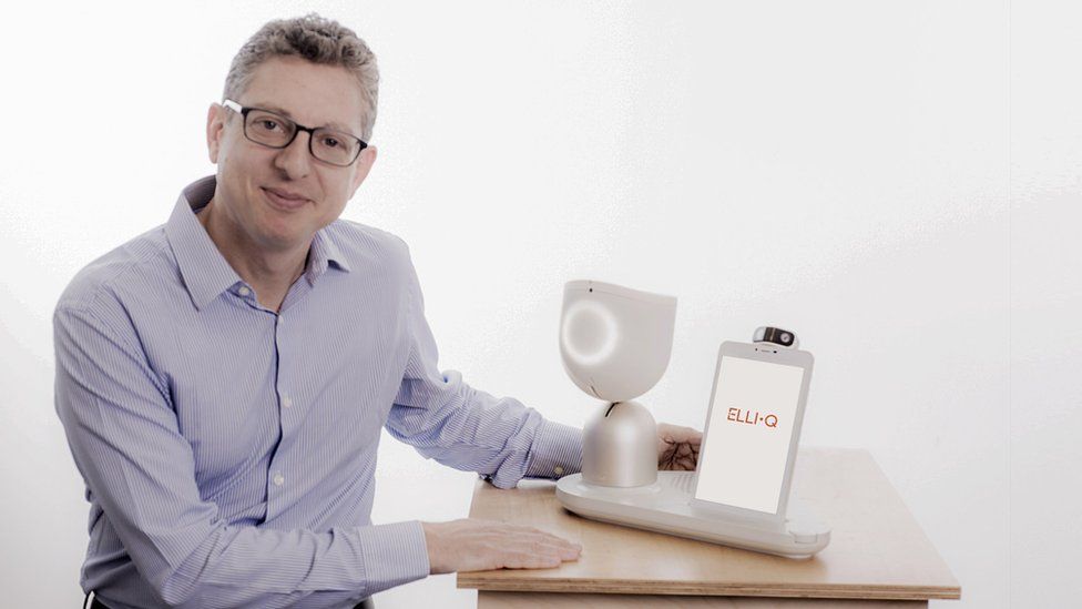 Intuition Robotics co-founder Dor Skuler with social home robot ElliQ