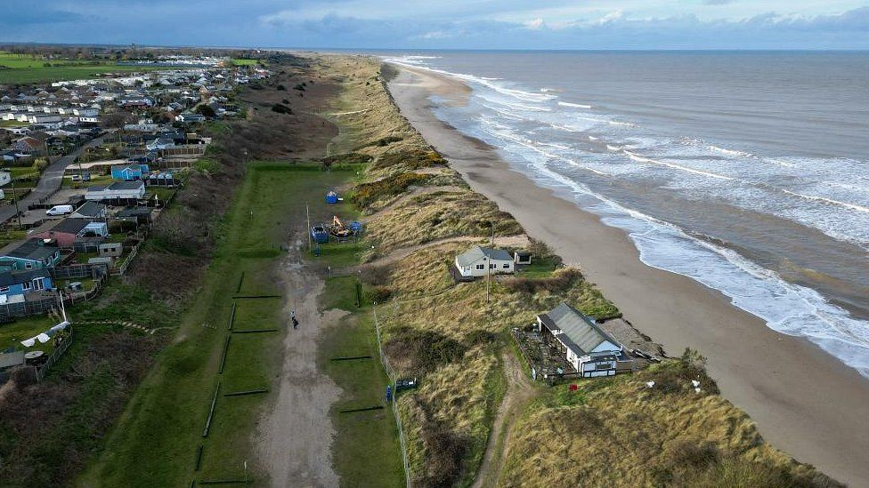 The Marrams, north of Hemsby Gap, showing the spaces where three properties have been demolished with the last two remaining
