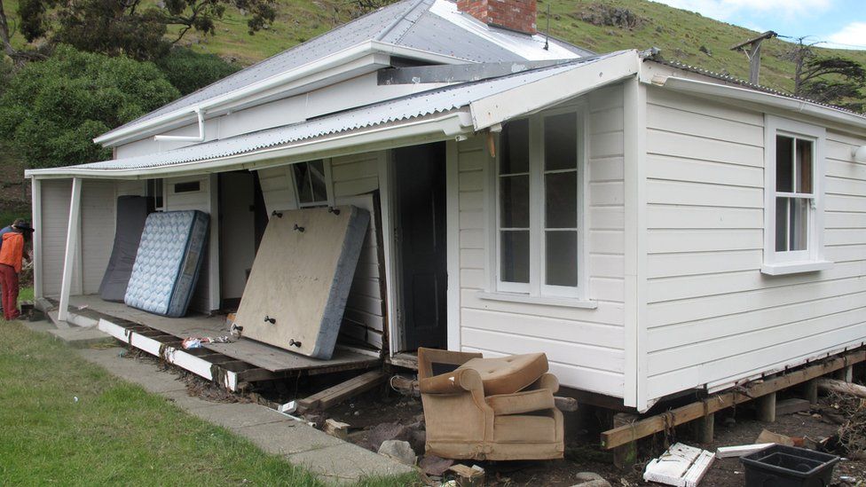 Tsunami damage to a house in Little Pigeon Bay on Banks Peninsula