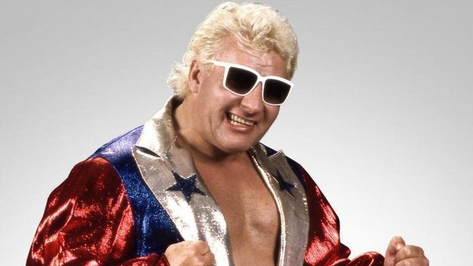 Johnny Valiant, seen here in sunglasses and a sparkly jacket