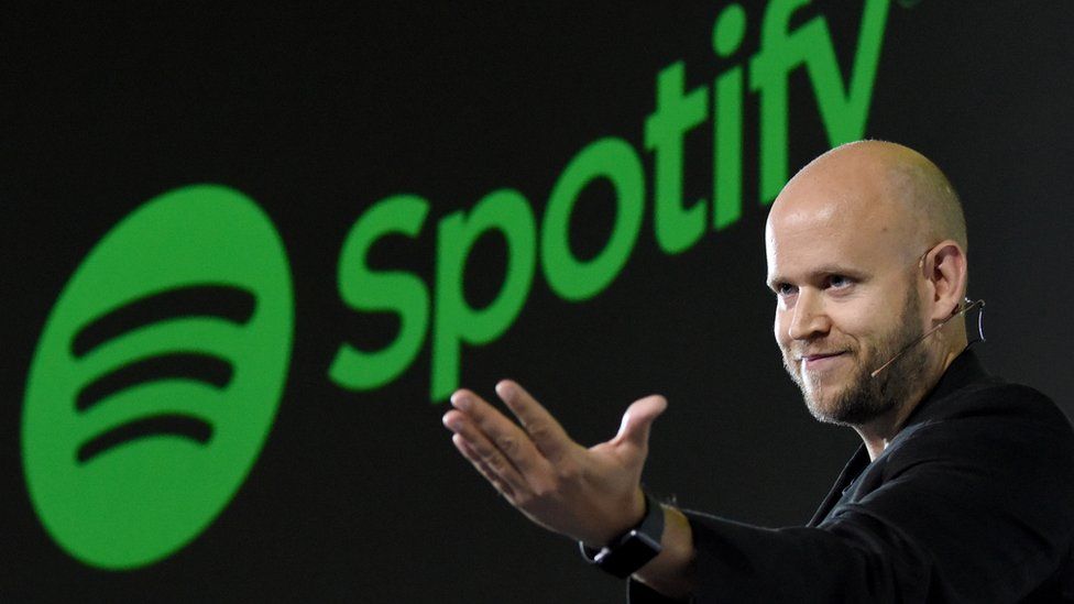 Daniel Ek, CEO of Swedish music streaming service Spotify, gestures as he makes a speech at a press conference in Tokyo on September 29, 2016.