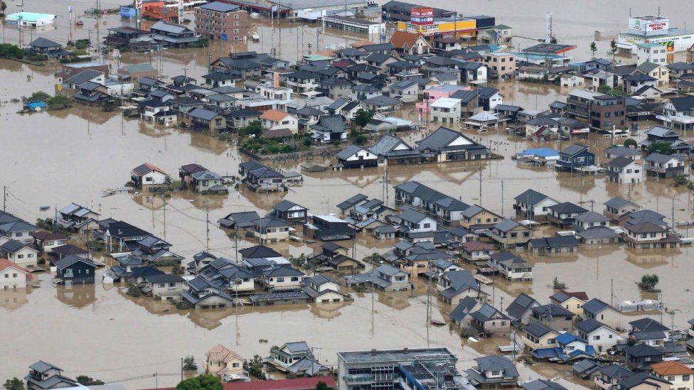 An aerial view of flooded houses in Kurashiki