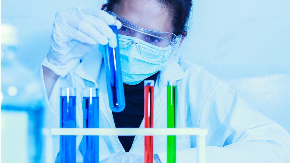 Scientists in a drugs laboratory