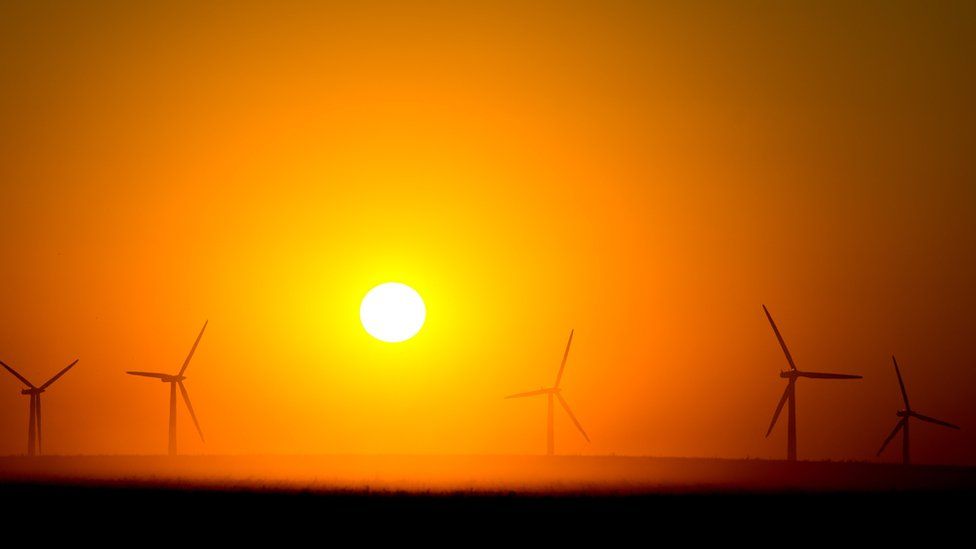 German wind farm with sunrise