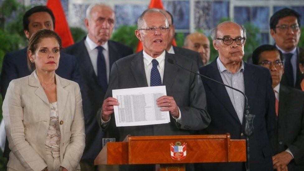 A handout picture distributed by the Peruvian Presidency shows President Pedro Pablo Kuczynski appearing in Lima on a televised message to the Nation on December 14, 2017