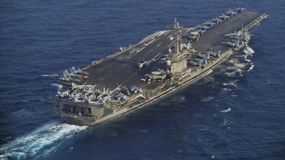 The Nimitz-class U.S. Navy aircraft carrier USS Carl Vinson sails offshore Nagasaki prefecture, southern Japan, in this aerial view photo taken by Kyodo 29 April 2017