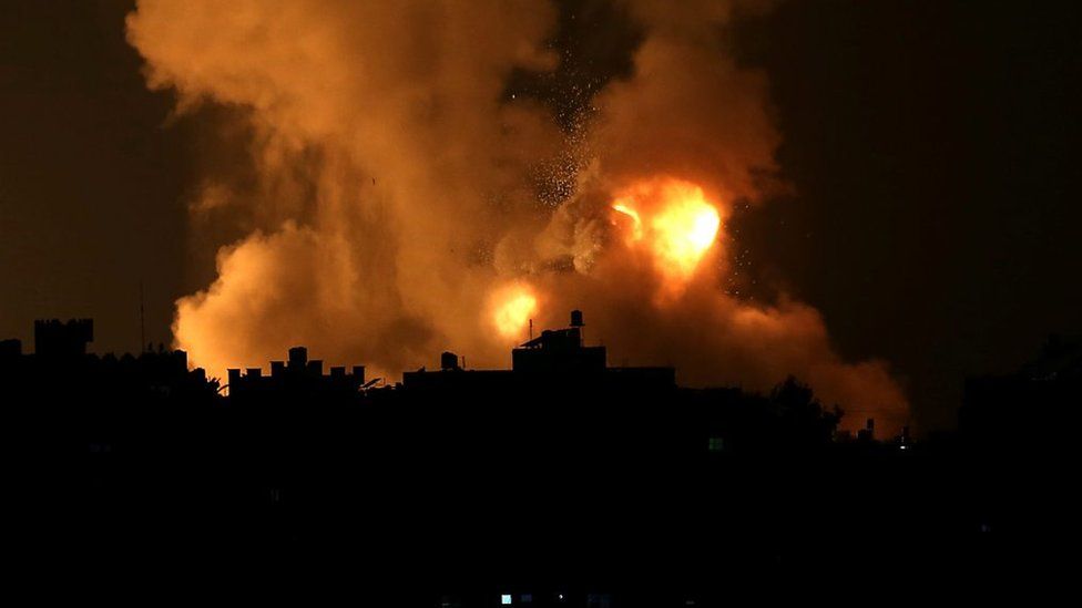 Smoke and flames rise above Gaza Strip