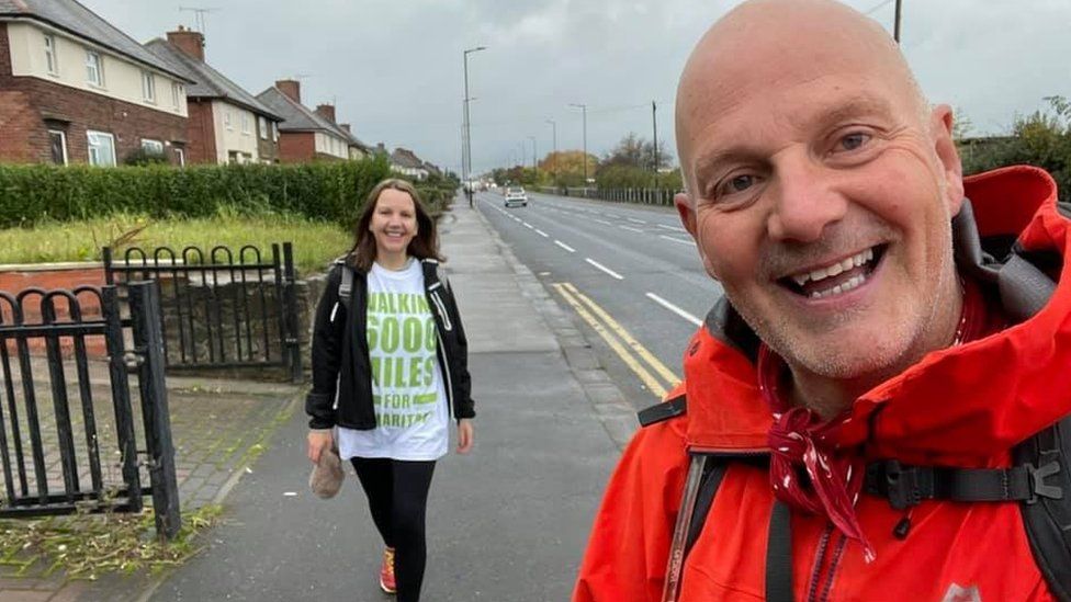 David Matthews walking with his sister, Helen Rogerson