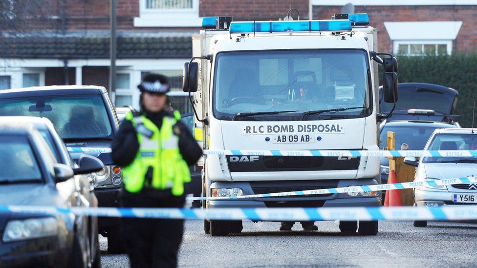 Police and the Bomb Disposal Unit outside a property in Chesterfield, Derbyshire