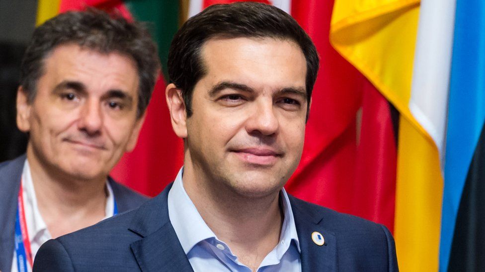 Greek Prime Minister Alexis Tsipras (foreground) and behind him Finance Minister Euclid Tsakalotos