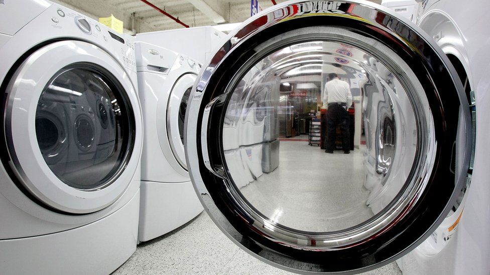 Clothes dryers displayed in an appliance store