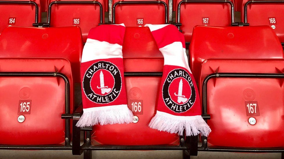 A Charlton Athletic scarf over a seat in the stadium