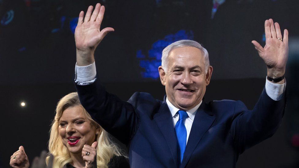 Israel's Prime Minister Benjamin Netanyahu and his wife Sarah celebrate following the election in Tel Aviv, Israel, early 10 April 2019