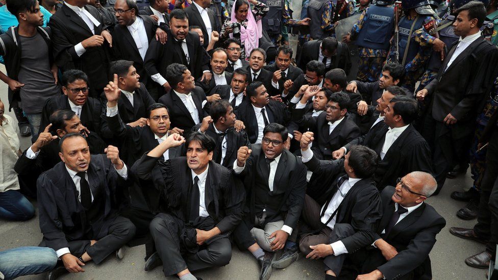 Lawyers supporting Bangladesh Nationalist Party (BNP) shout slogans as they sit on a street during a protest in Dhaka, Bangladesh February 8, 2018