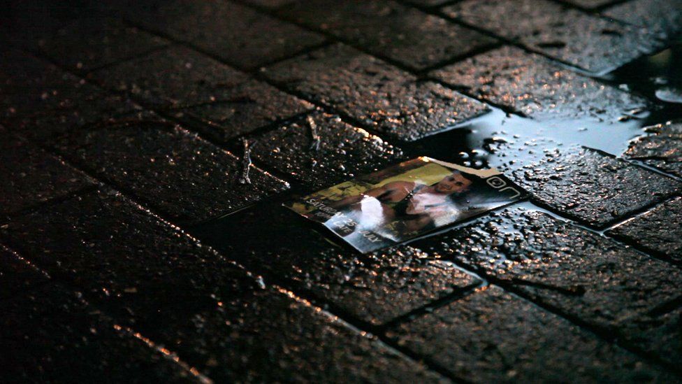 Poster in a puddle