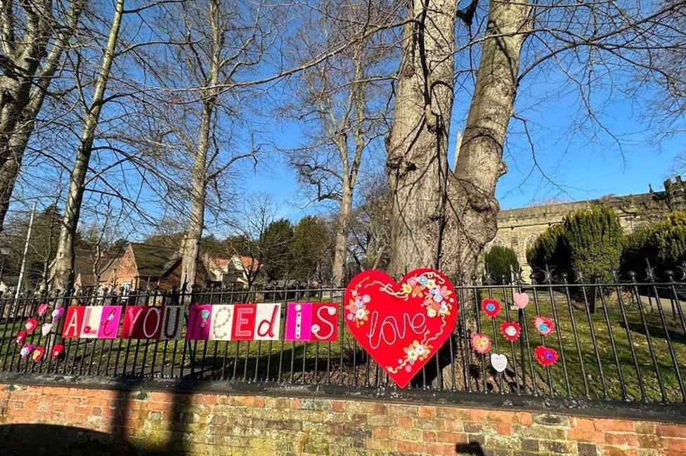 Valentine's Day knitting outside St Peter's Church in Ruddington