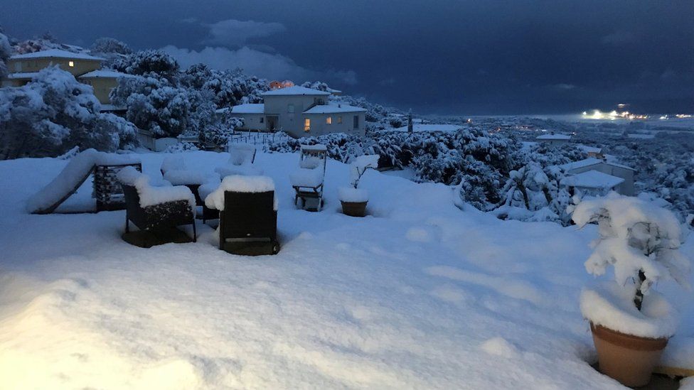 A house garden covered with snow near Ajaccio on the French Mediteranean island of Corsica
