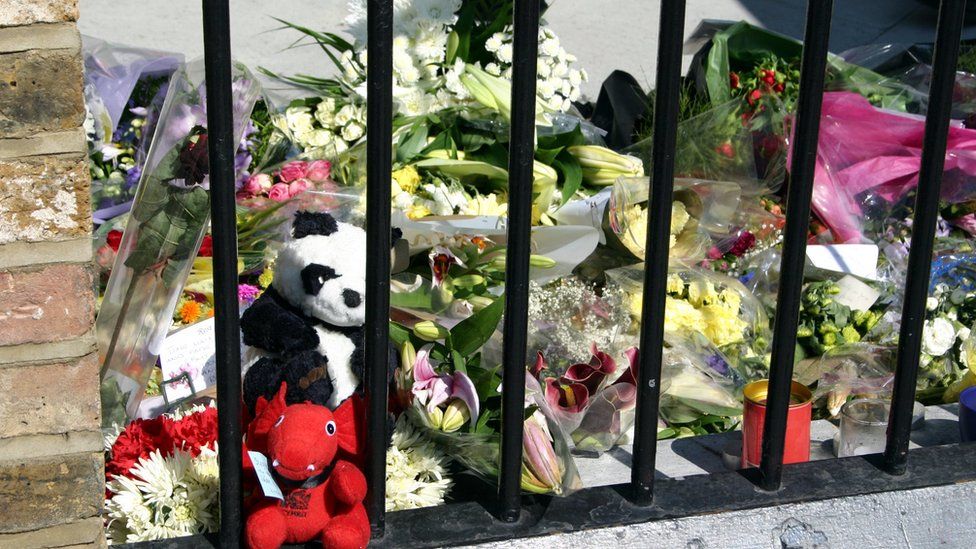 Flowers and letters of condolence are seen in the area outside Kings Cross Station set aside for floral tributes, 12/07/2005, following the London terror attack on 7th July 2005.