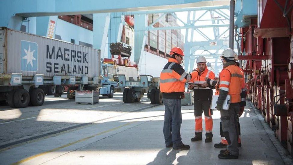 Maersk crew handling customs clearance at a port