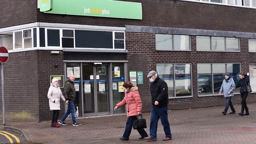 People outside a Jobcentre Plus in Stoke-on-Trent