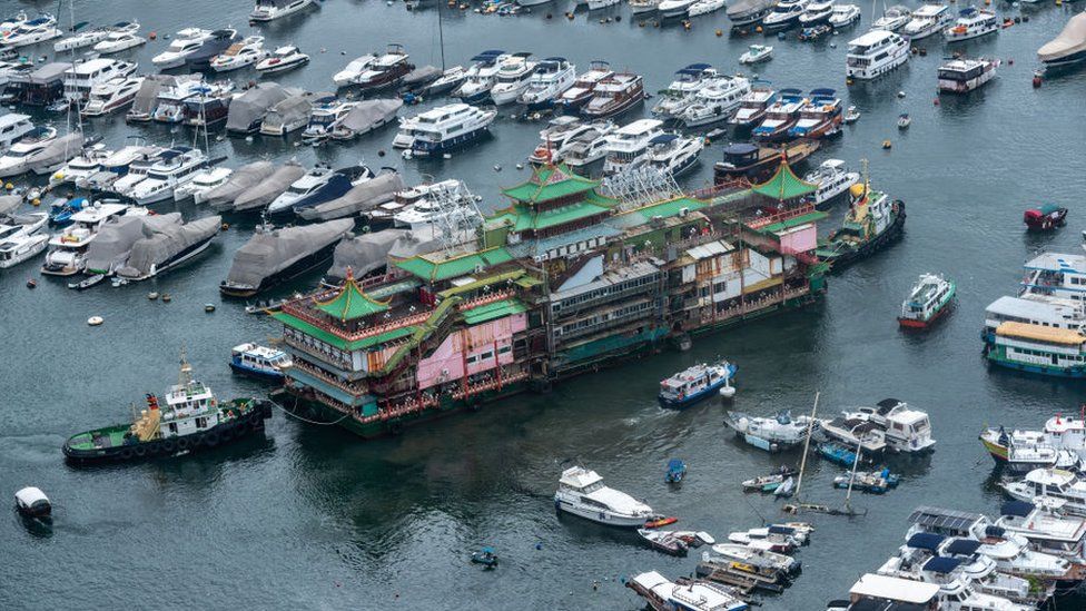 The famous Jumbo Floating Restaurant is towed away by tugboats after 46 years as a much-loved tourist attraction in Aberdeen, Hong Kong.