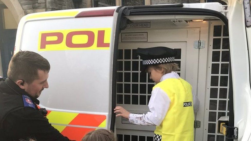 Police riot van at Stanley's party