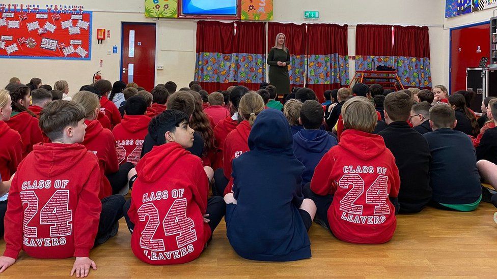 Year 5 and 6 pupils at Bailey's Court Primary School sat in the school hall listening to a talk