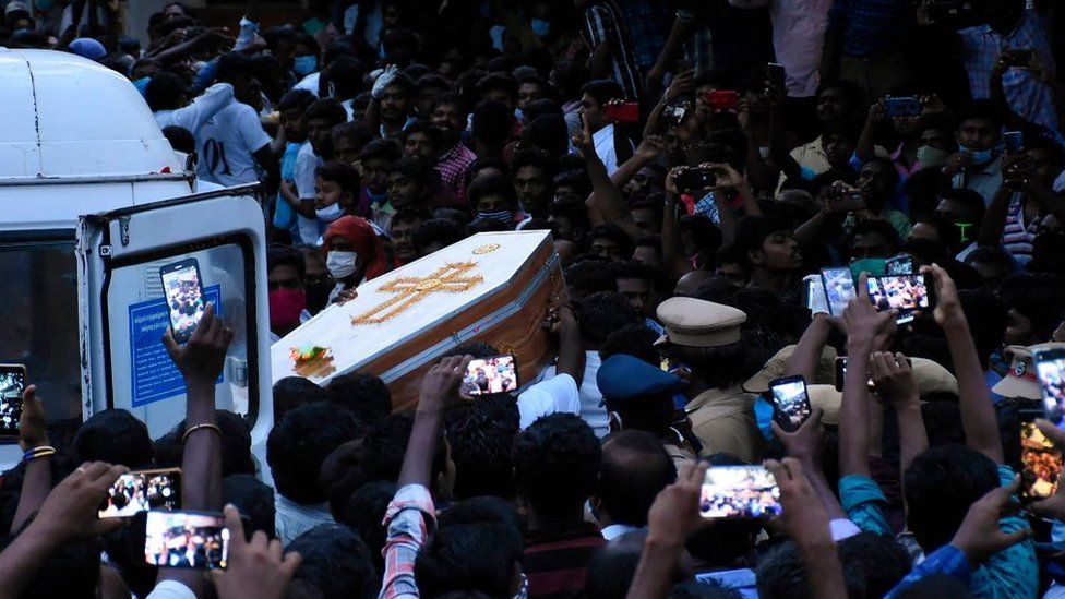 Residents gather as they carry the coffin of Jeyaraj, 58, and son Fenix Immanuel, 31, allegedly tortured at the hands of police in Sathankulam, Thoothukudi district in the Indian state of Tamil Nadu.